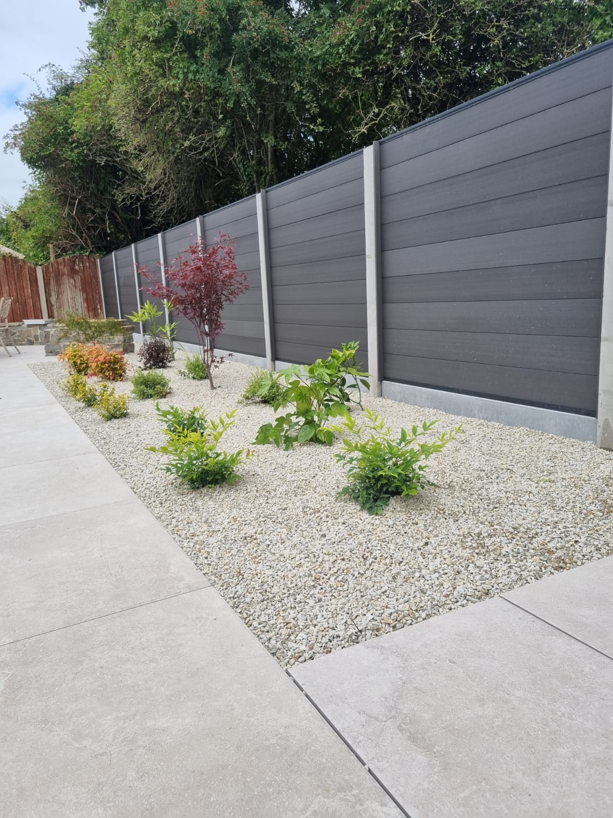 Natural stone patio with fencing