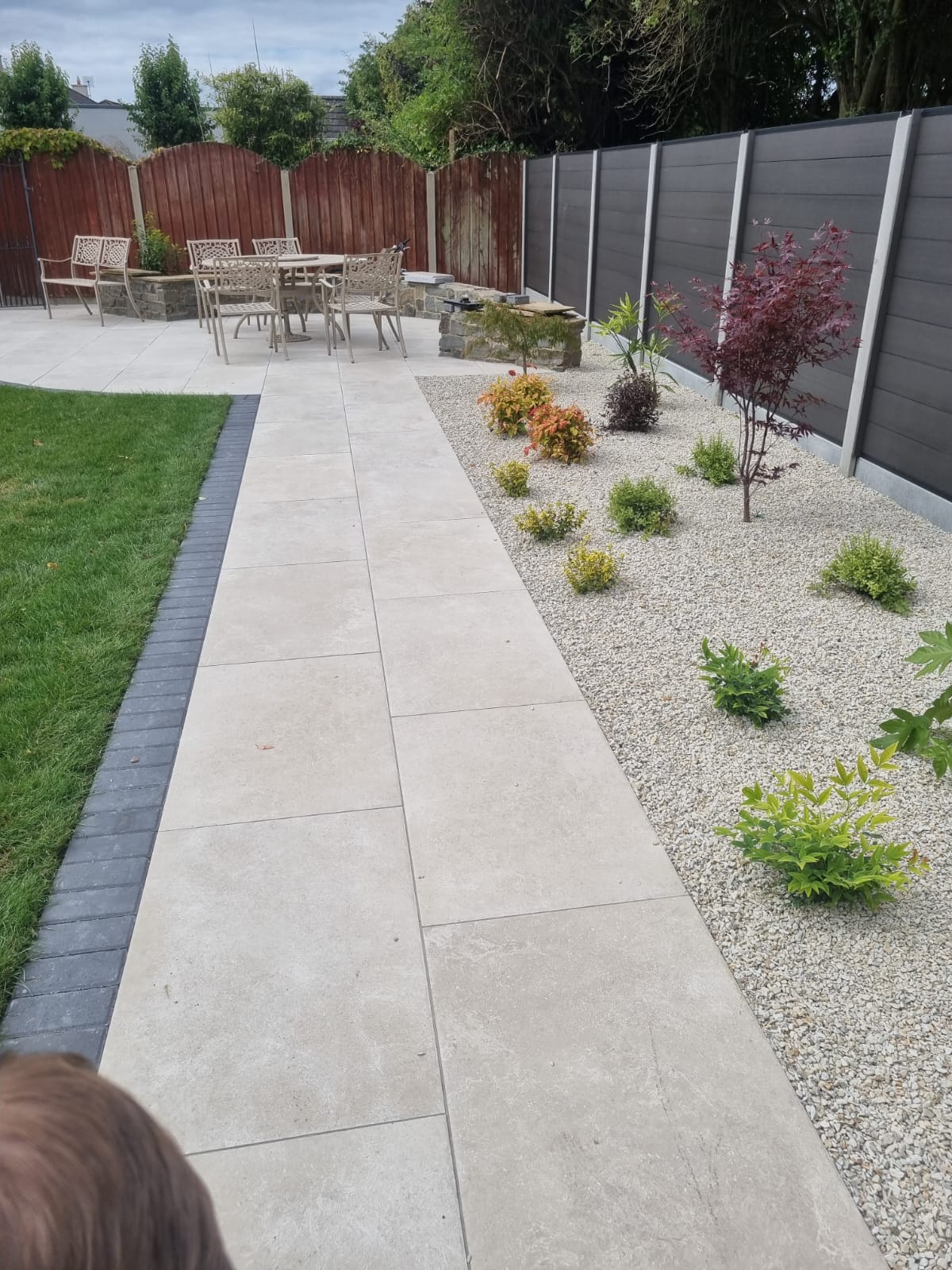 Porcelain patio with landscaping